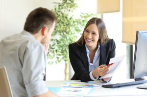 69027593 - boss showing a good job congratulating an employee at office