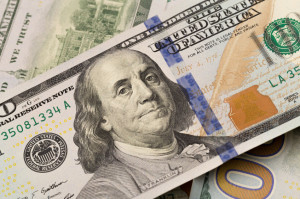 Dollars closeup. Benjamin Franklin's portrait on a bill.Concept of money and earnings.