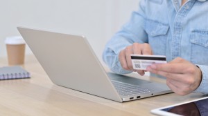 141825519 - online payment on laptop, close up